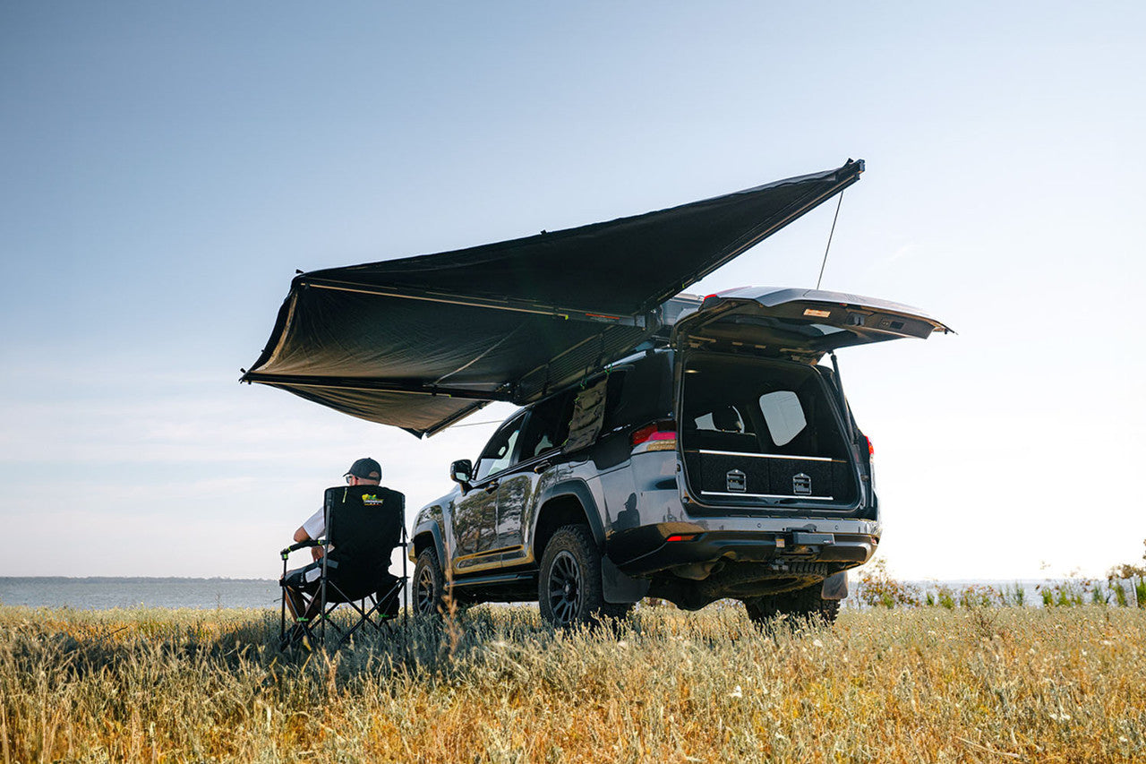 Roof top tent with awning tent attached at ground level